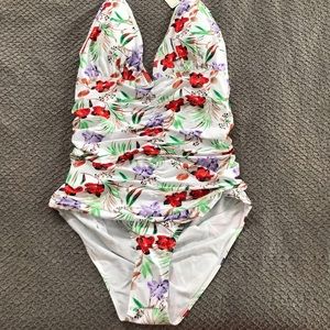 NWT Upopby one piece halter white floral swim suit.